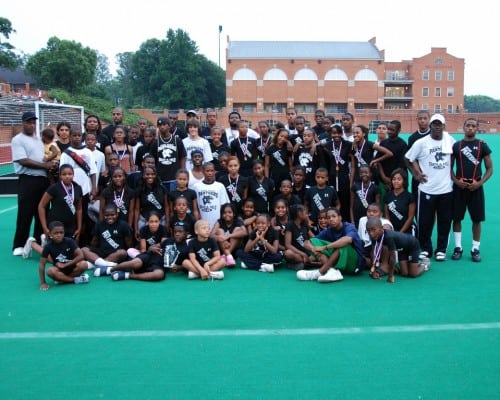 Panthers Elite Track & Field team group photo on the field.