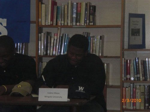 Cedric Ellison signing with Wingate University at Panthers Elite Track & Field Club event.