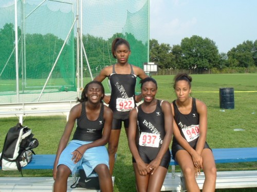 Panthers Elite Track & Field athletes posing outdoors at a track meet.
