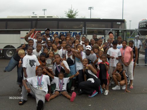 Panthers Elite Track & Field Club youth team group photo at a track event.