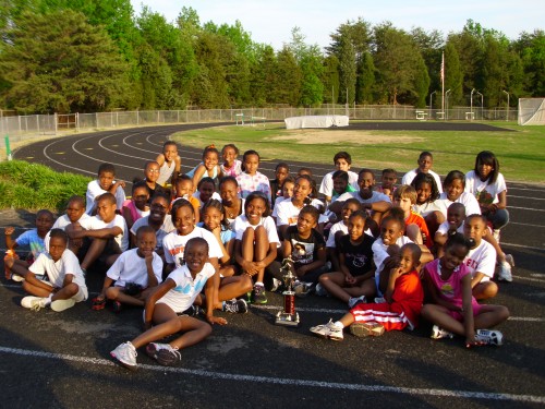 Panthers Elite Track & Field Club youth team celebrating victory at the 2011 NC (AAU) Area 5 Champio.