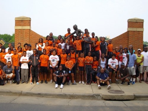 Bright group photo of Panthers Elite Track & Field Club celebrating their 2011 NC (AAU) Area 5 Champ.