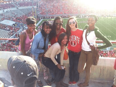 A vibrant group of young female athletes at a stadium during the 2012-2013 collegiate recruiting per.