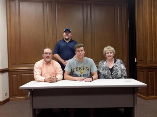 Panthers Elite Track & Field athlete Kaylah Ruff with family at signing event.