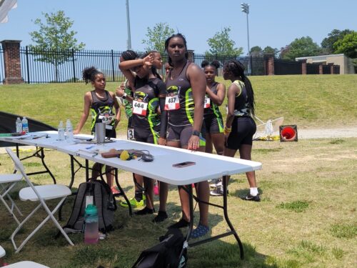 Panthers Elite athletes preparing for a race at the track meet.