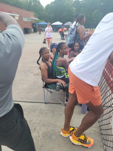 Young athletes at Panthers Elite Track & Field event, preparing for competition.