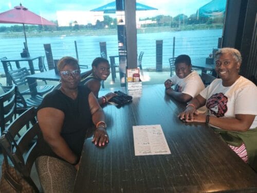 Young athletes enjoying a meal together.