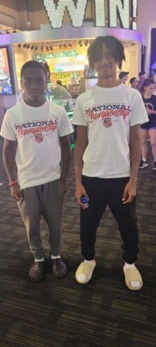 Two young male athletes at Panthers Elite Track & Field Club event.