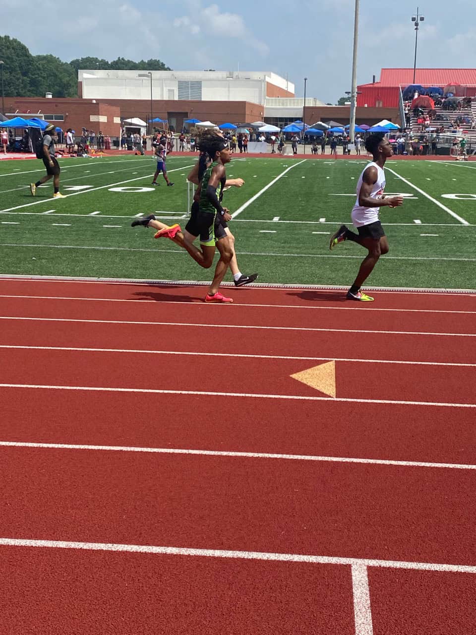 Young athletes competing in a sprint race at Panthers Elite Track & Field event.