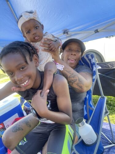Young athletes enjoying a sunny day at Panthers Elite Track & Field Club.