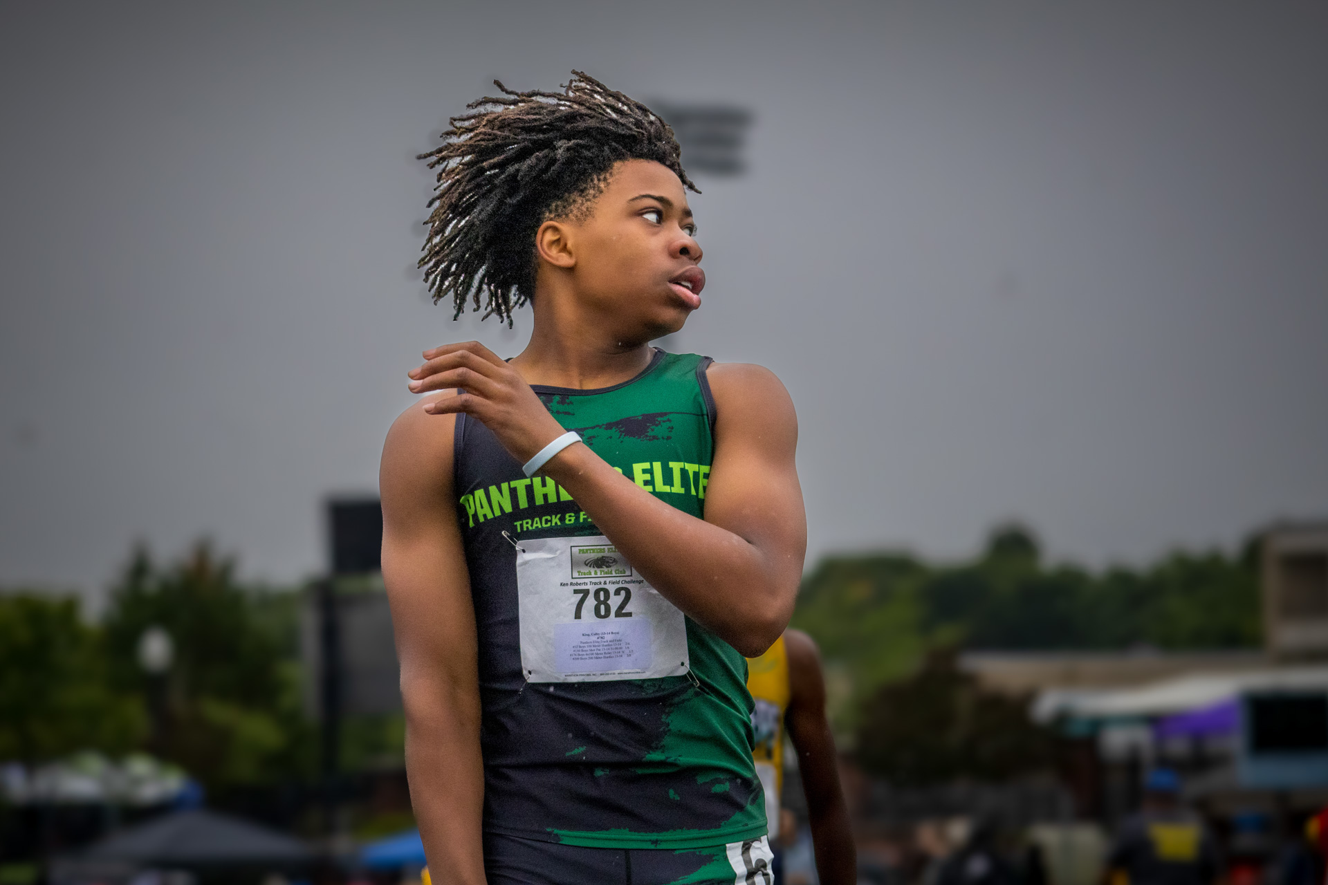 Female track athlete from Panthers Elite Track & Field Club preparing for a race.