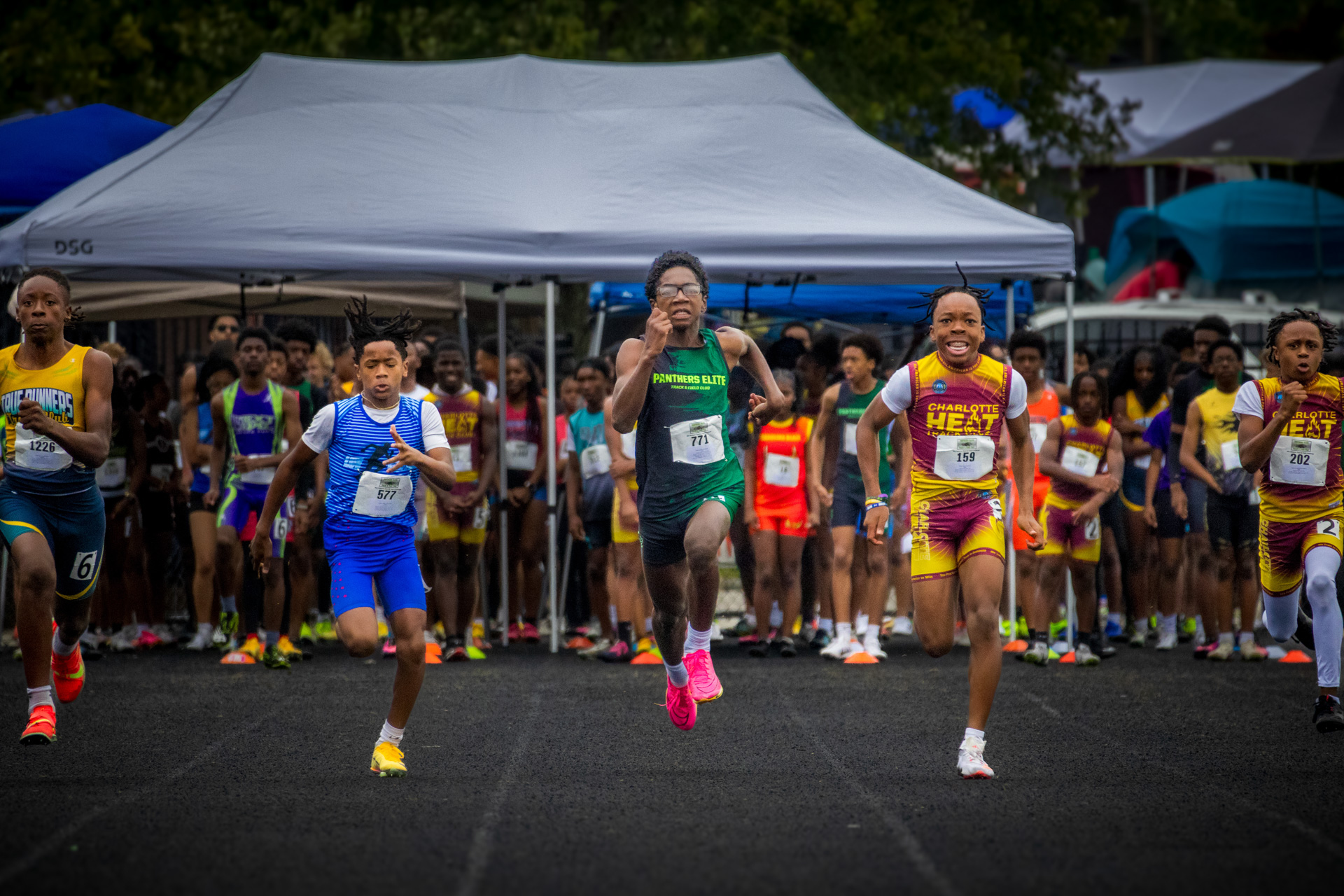 Young athletes competing in a track race at Panthers Elite Track & Field Club event.