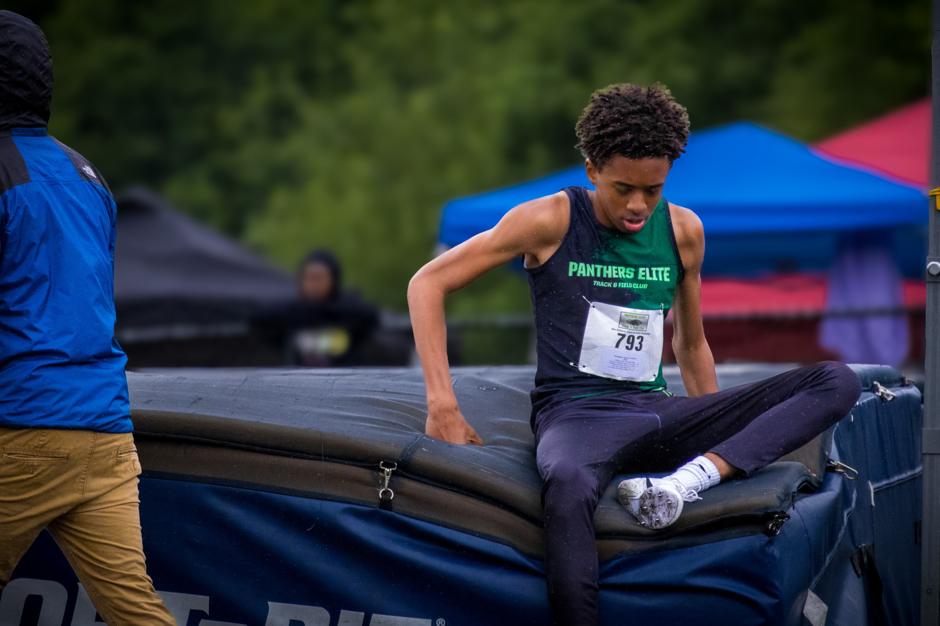 Young athlete from Panthers Elite Track & Field preparing for a jump event at a meet.
