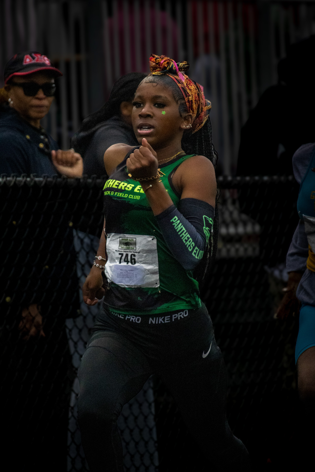 Athlete competing in a track event at Panthers Elite Track & Field Club meet.