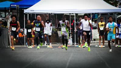 Group of athletes at the starting line ready for a race at Panthers Elite Track & Field Club.