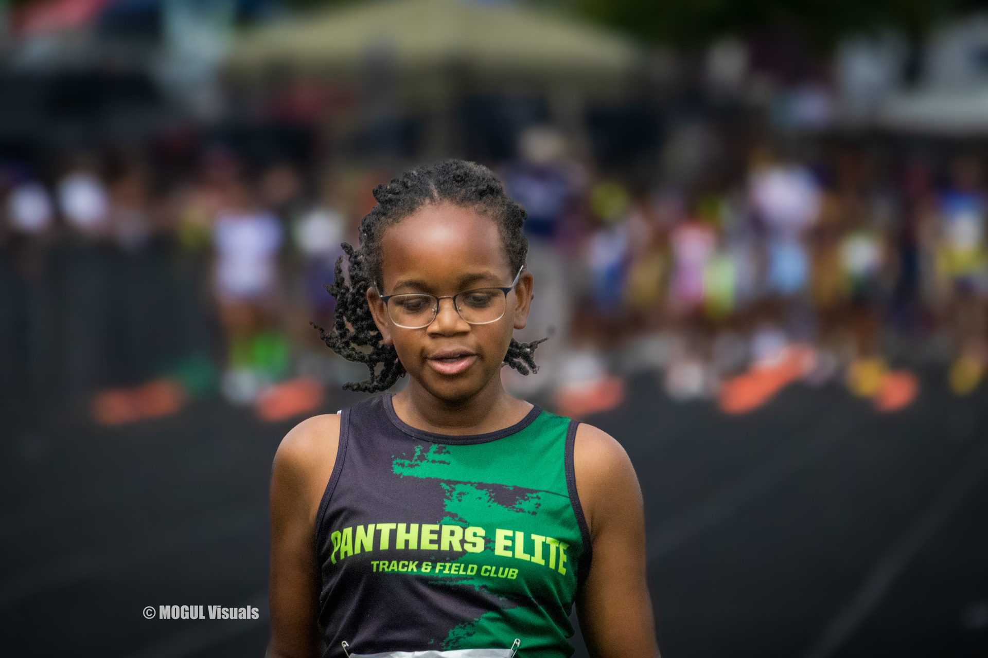 Athlete wearing Panthers Elite Track & Field Club uniform at a track meet.