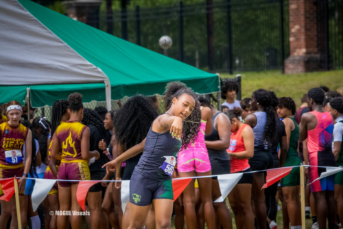 Young female athlete preparing for a race at a Panthers Elite Track & Field event.