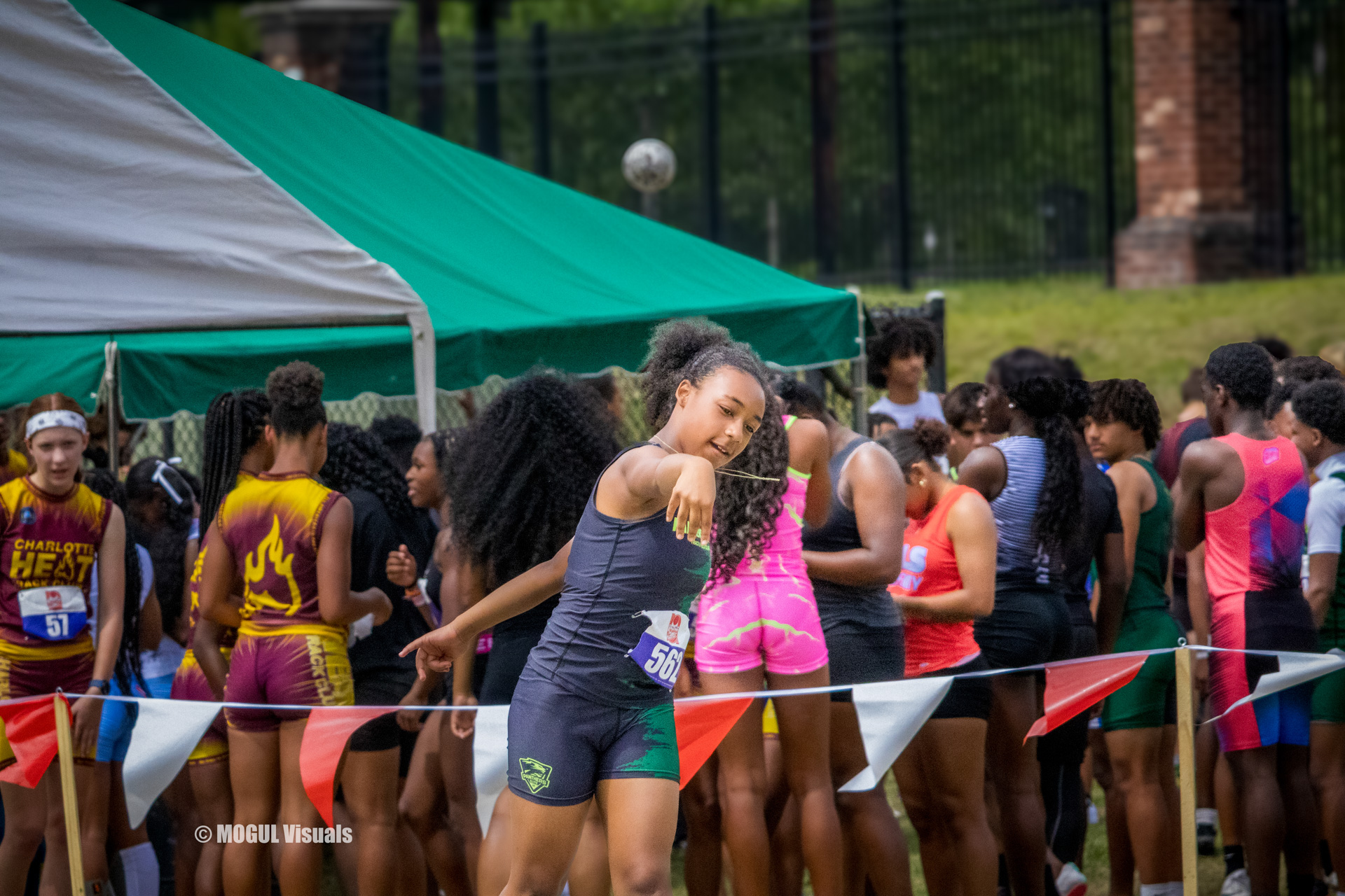 Young female athlete preparing for a race at a Panthers Elite Track & Field event.