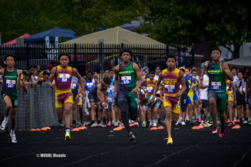 Young athletes competing in a track race at Panthers Elite Track & Field Club event.