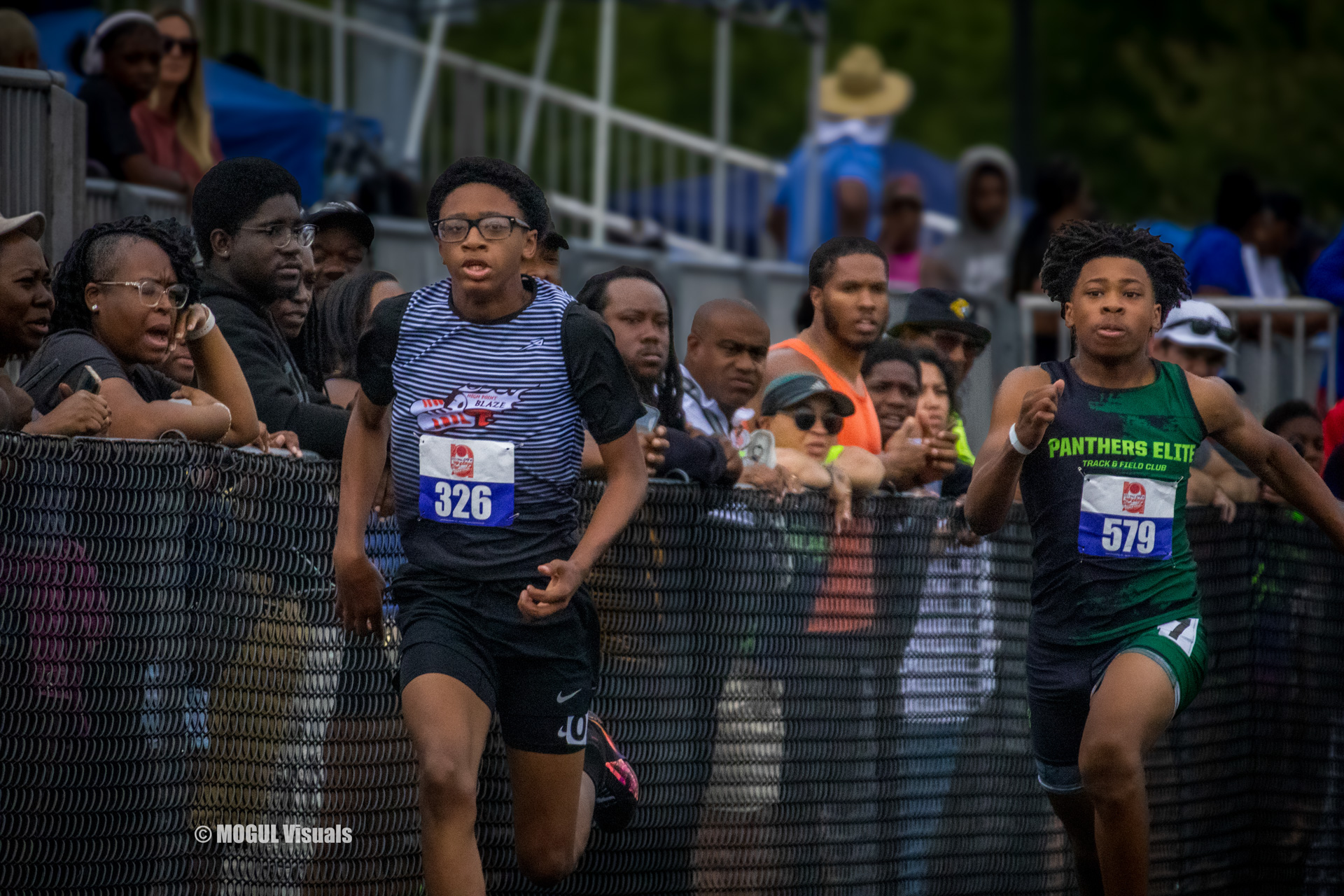 Young athletes competing in a track race at Panthers Elite Track & Field Club event.