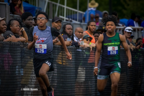 Young athletes competing in a track race at Panthers Elite Track & Field Club event.