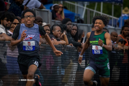 Young athletes competing in a track race at Panthers Elite Track & Field Club event.
