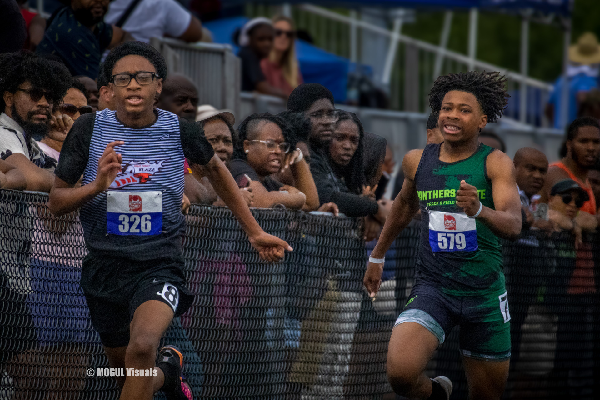 Young athletes competing in a track race at Panthers Elite Track & Field Club event.