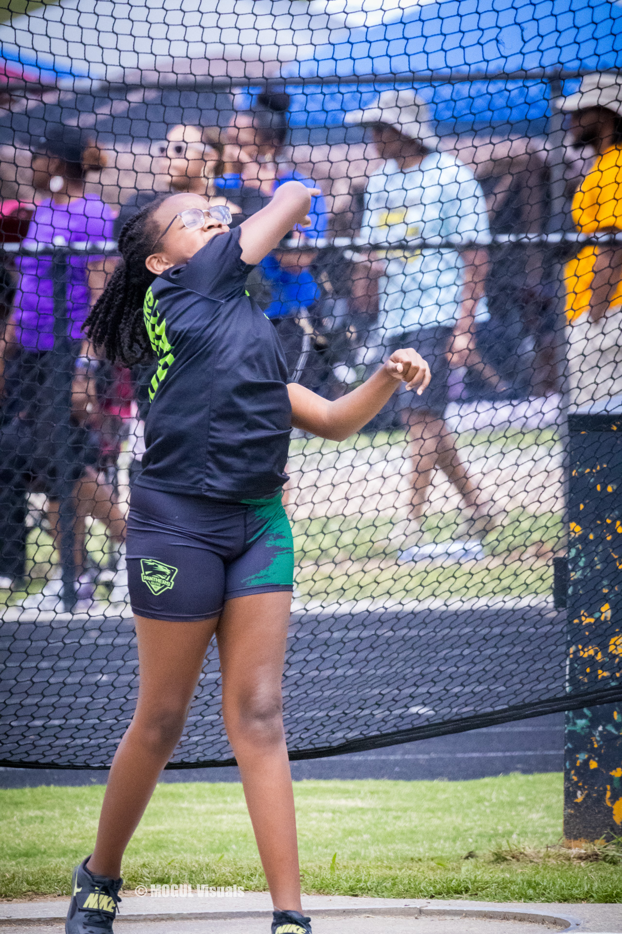 Athlete preparing to throw a discus during a track and field event at Panthers Elite.