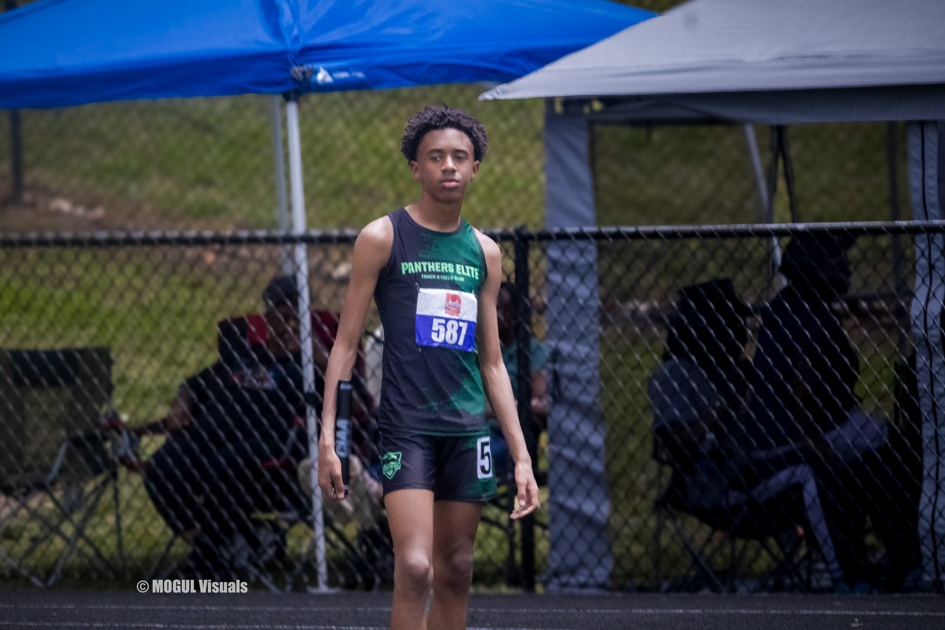 Athlete at Panthers Elite Track & Field Club preparing for a race on the track.