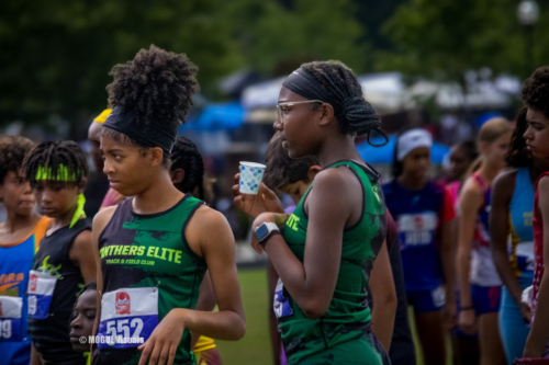 Panthers Elite track athletes preparing for a race at the event.