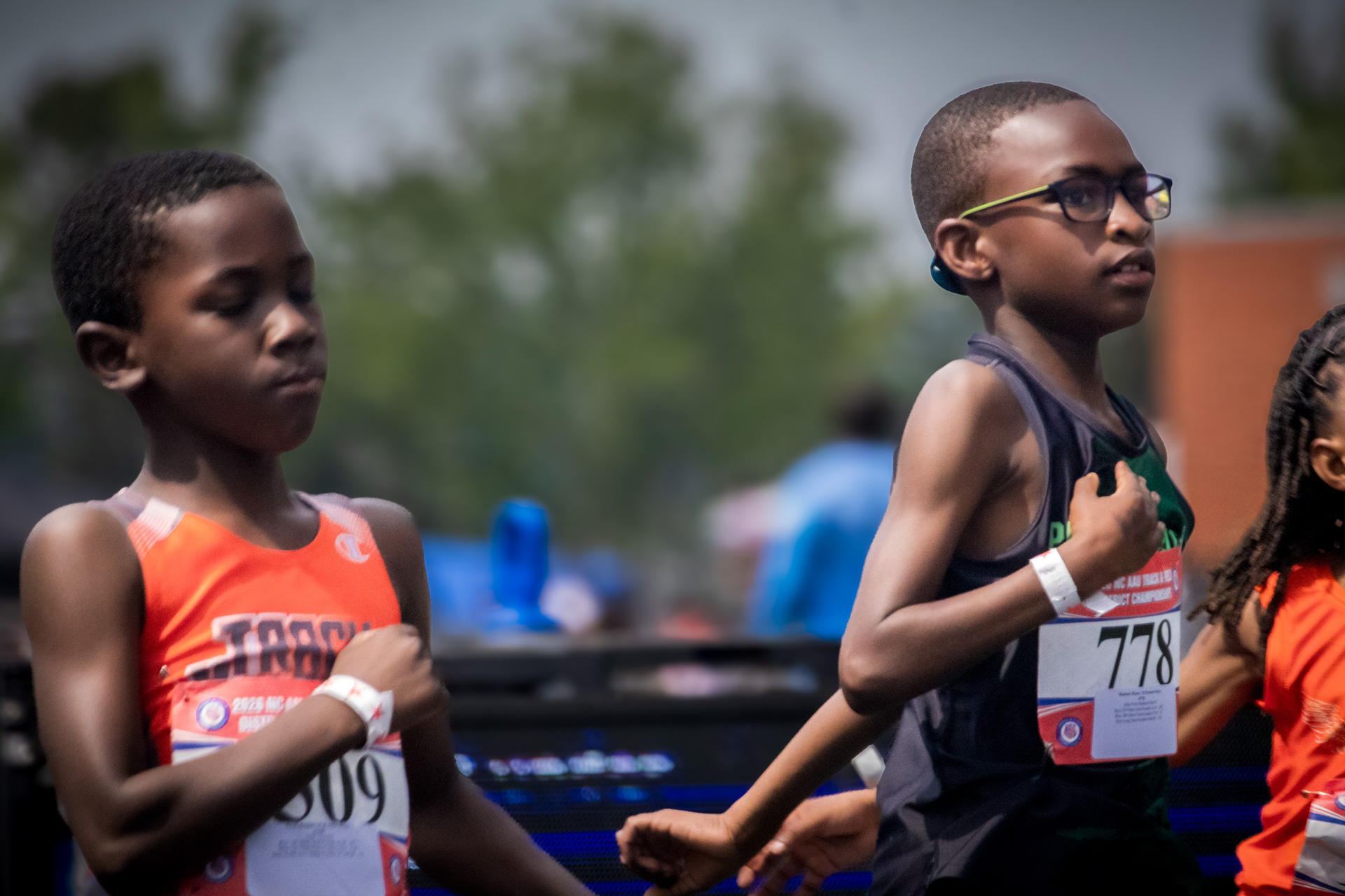 Young athletes competing in a track event at District Qualifier 2026.