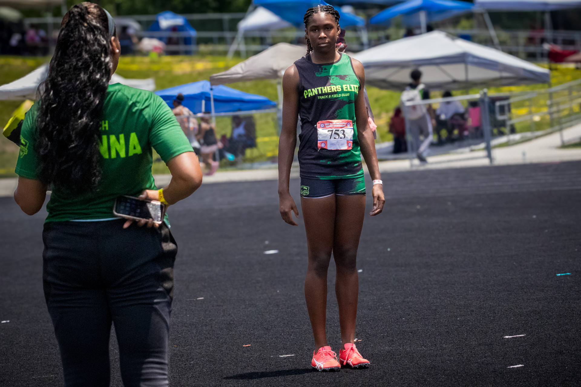 Panthers Elite athlete preparing for race at district qualifier event.