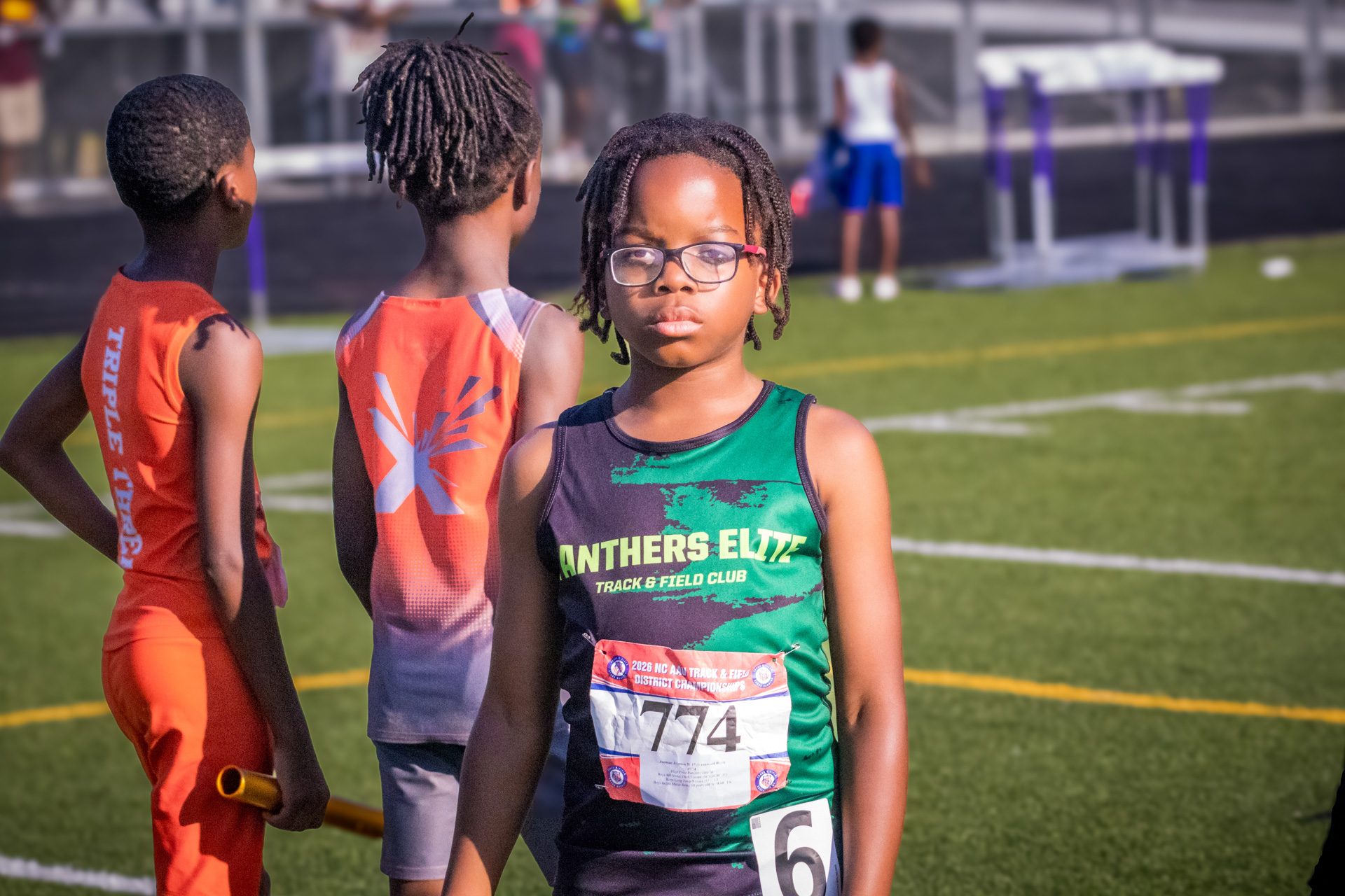Young athlete from Panthers Elite Track & Field Club at district qualifier meet.