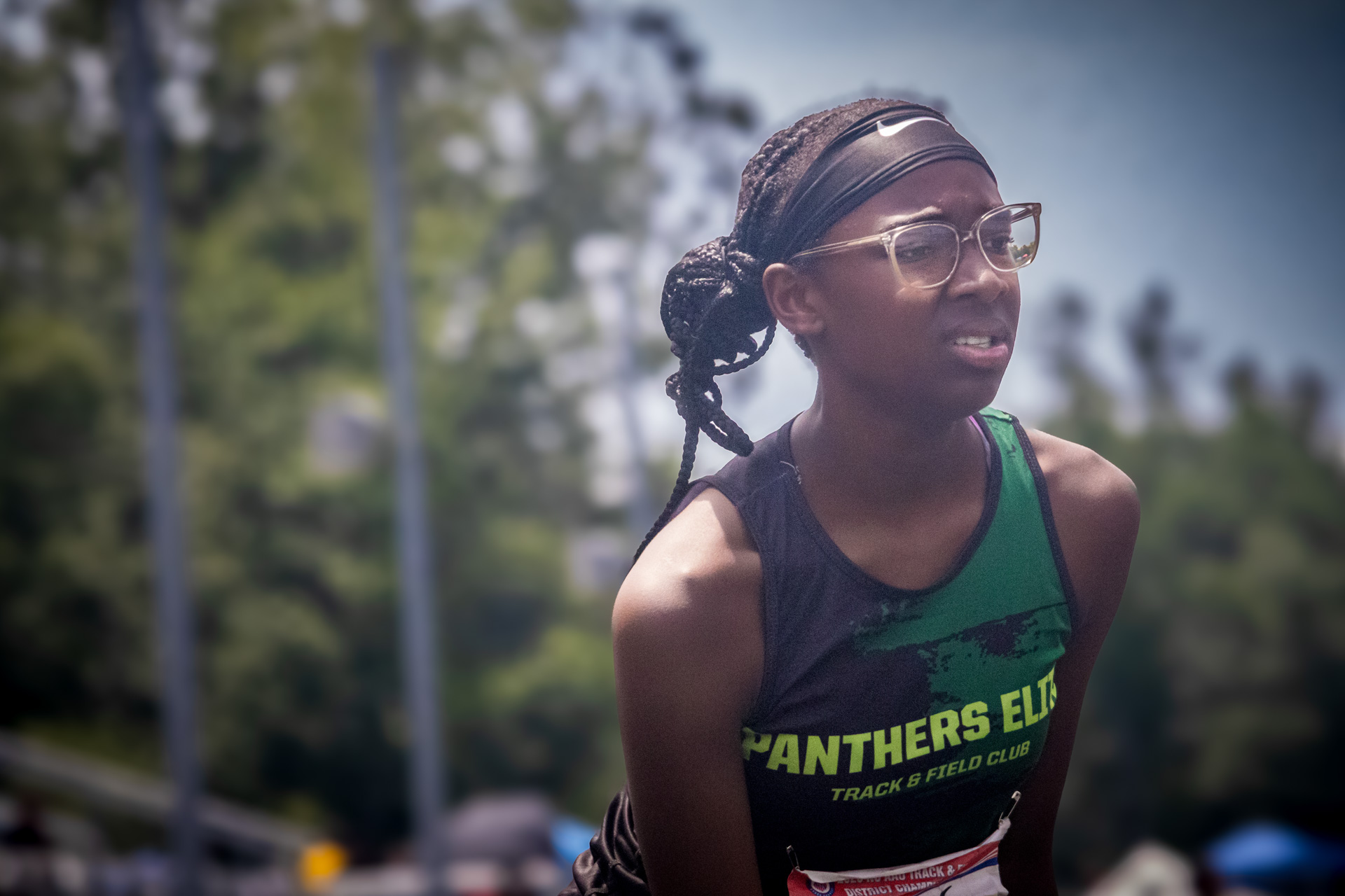 Female track athlete from Panthers Elite Track & Field Club during race.