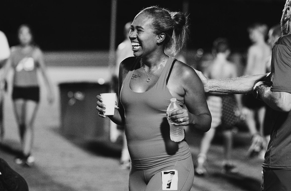 Panthers Elite athlete smiling during a track meet at The Victory Lap 2026.