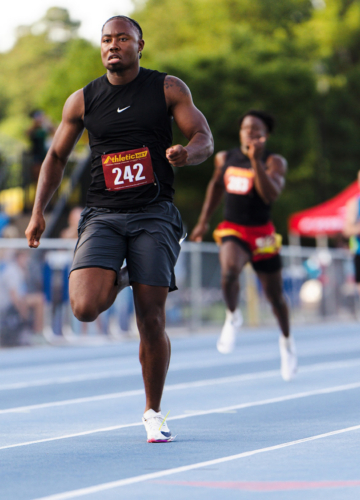 Panthers Elite athlete sprinting on the track at The Victory Lap 2026.