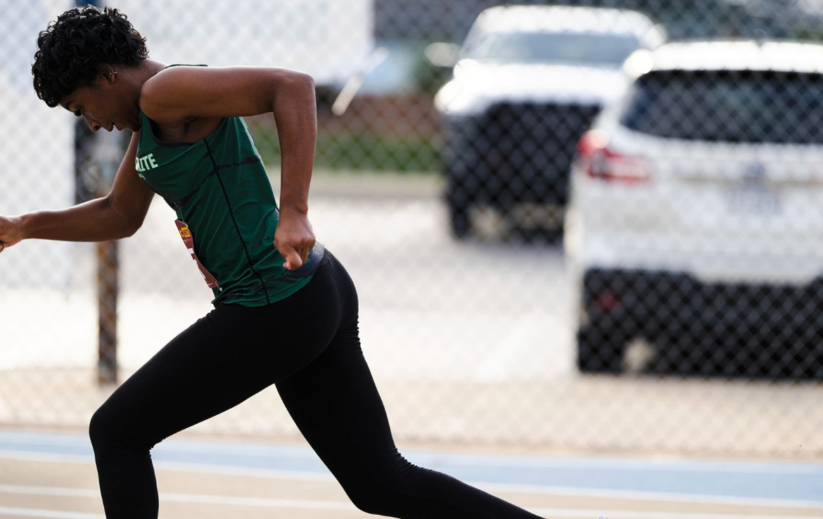 Panthers Elite athlete sprinting during a track meet at The Victory Lap 2026.