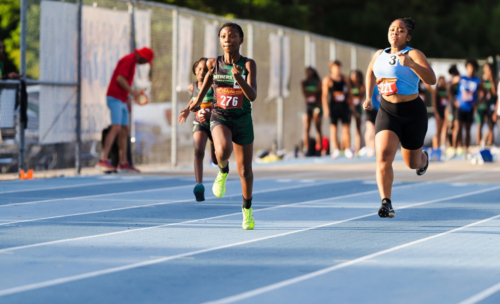 Young athletes competing in a sprint race at The Victory Lap 2026 event.