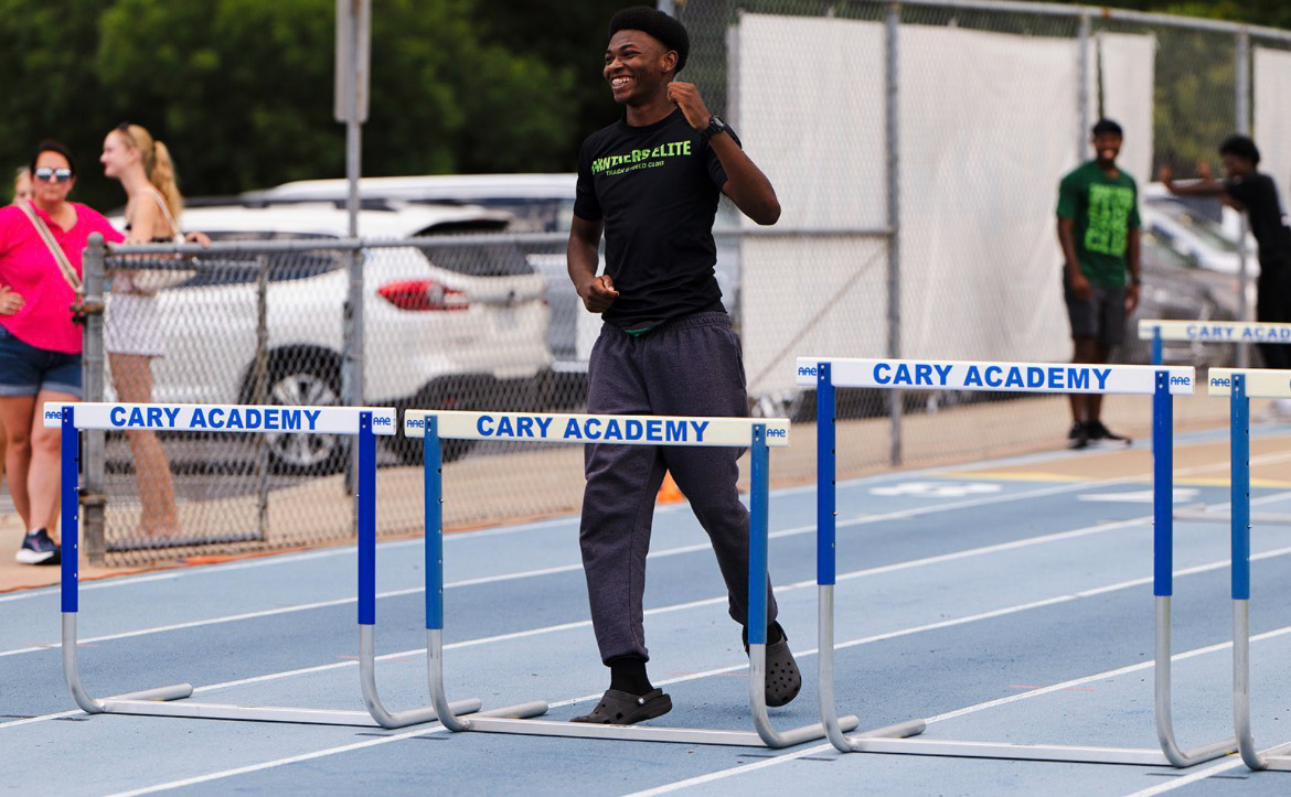 Panthers Elite athlete crossing hurdles at The Victory Lap 2026 event.